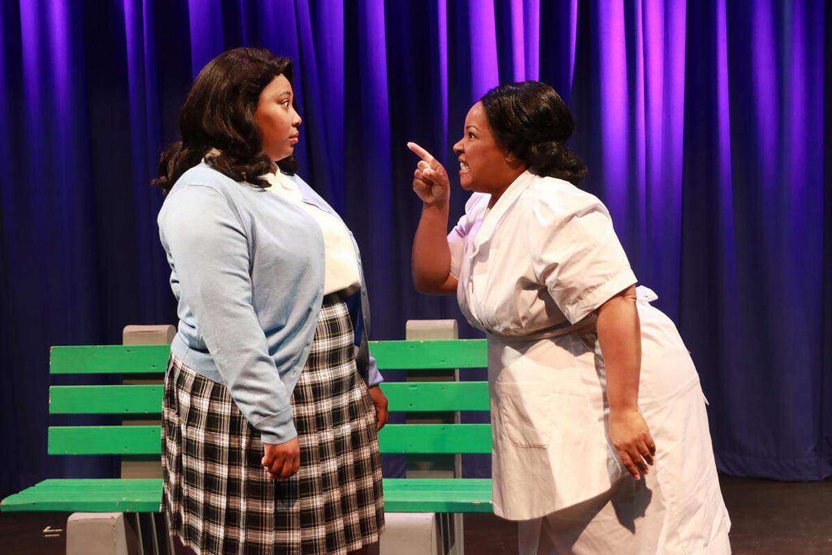 Annaya Charlicia,. left, as Caroline’s best pal Dotty Moffett, and Kareema Khouri as Caroline in the Actors’ Playhouse production of “Caroline, or Change.”