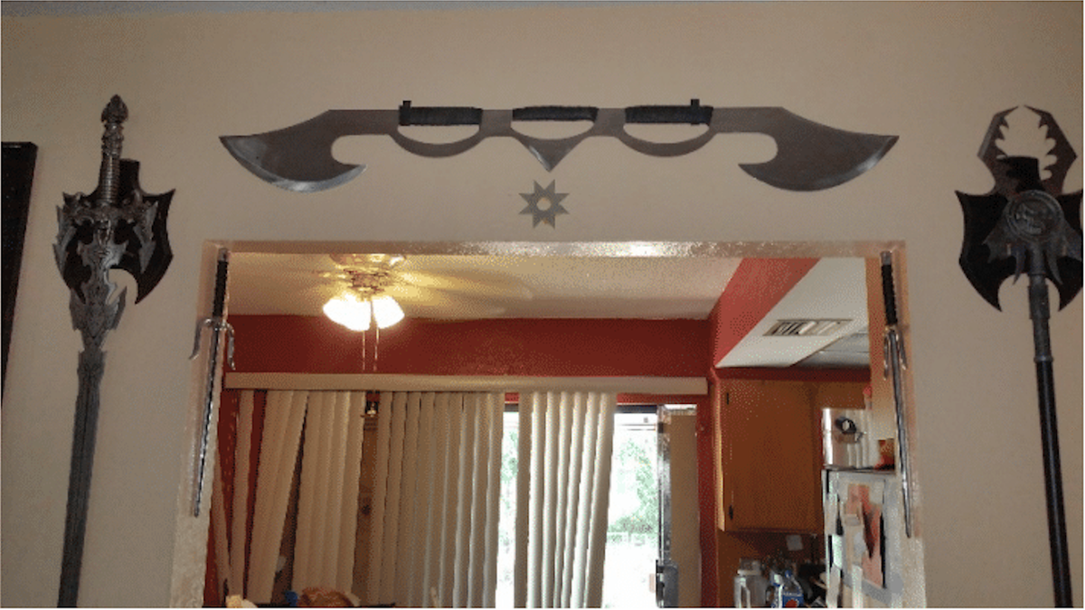 Star Trek memorabilia and decorative blades affixed to the walls of Raymond Purcell’s home. Source: lawsuit complaint
