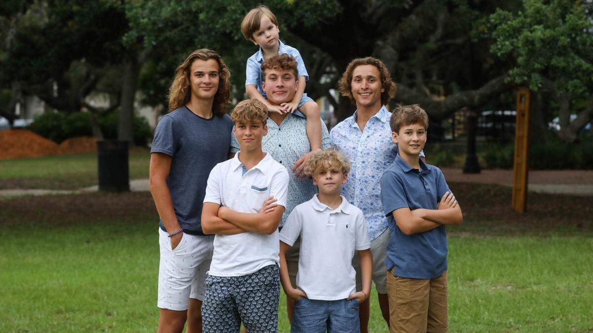 The Williams brothers in 2021, before Emory cut his hair short. Front row, left to right: Tate, now 16; Caleb, 13; Graham, 14. Back row, left to right: UM quarterback commit Emory, 18; Aubrey, 22; Greyson, 21; Ross, 6, is on Aubrey’s shoulders.