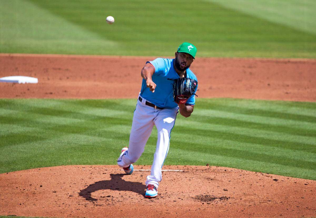 Miami Marlins pitcher Sandy Alcantara (22) pitches against the New York Mets during the second inning of their spring training baseball game at Roger Dean Chevrolet Stadium on Wednesday, March 17, 2021 in Jupiter, Florida.