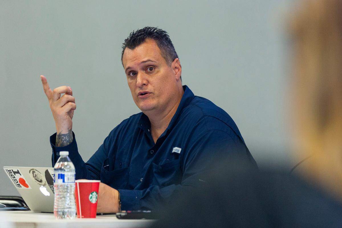 Carlos Alvarez hosts a meetup group for Amazon resellers in Miami on Saturday, December 15, 2018. The free meetup aims to teach members how to successfully launch and sustain a business selling items on Amazon.