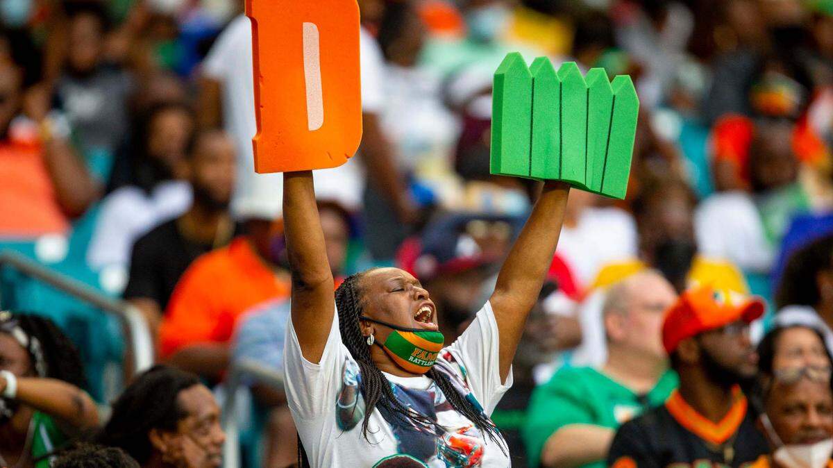 A FAMU fan holds up a foam ‘D-Fence’ in the crowd during the first quarter of the Orange Blossom Classic against Jackson State University at Hard Rock Stadium in Miami Gardens, Florida, on Sunday, Sept. 5, 2021.