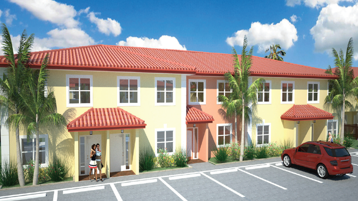 Redwood National Properties, an affiliated company of the Wynwood-based BAS Holdings, is moving forward with a $26 million affordable housing project in Opa-locka after receiving a $19 million construction loan. Above: A rendering of one of townhouses.