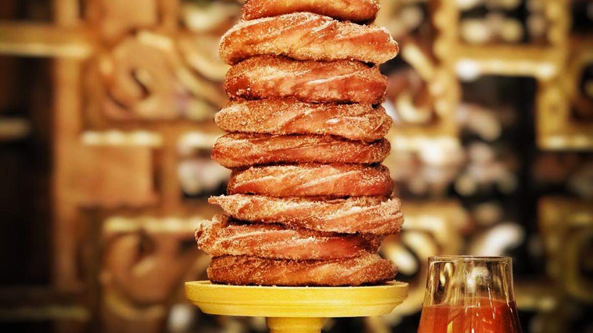 A churro tower is for dessert at the new Chica by chef Lorena García.