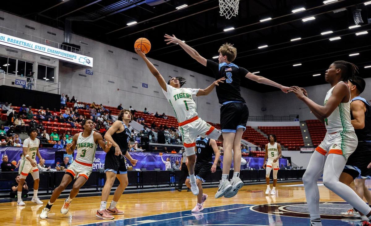 Blanche Ely Tigers’ Dylon Hanna (1) attempts to score as Ponte Vedra’s Trace Westercamp (3) defends during the FHSAA Class 5A Final for Boys High School Basketball State Championship at the RP Funding Center in Lakeland, Florida on Friday, March 7, 2025.
