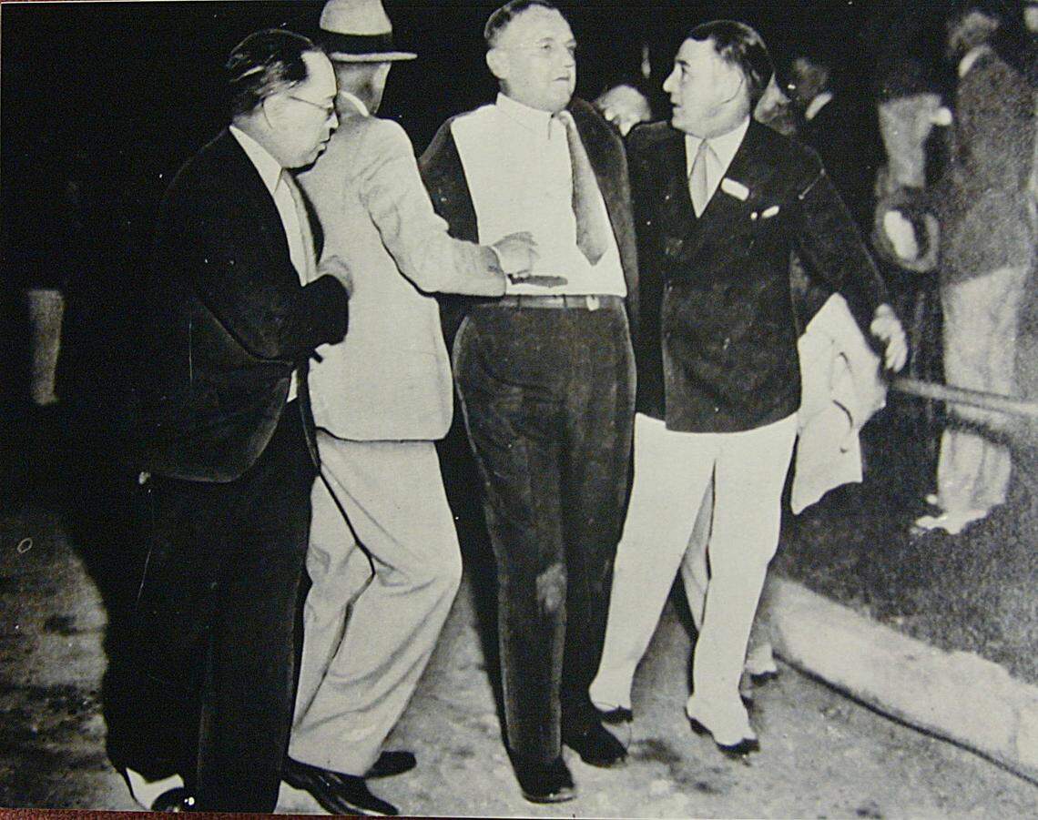 Chicago Mayor Anton Cermak, center, after he was shot in Miami in 1933.