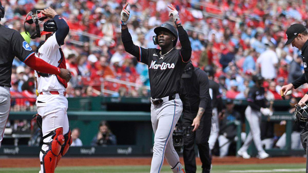 Apr 7, 2024; St. Louis, Missouri, USA; Miami Marlins outfielder Jazz Chisholm Jr. (2) reacts after hitting a three run home run against the St. Louis Cardinals during the first inning at Busch Stadium.