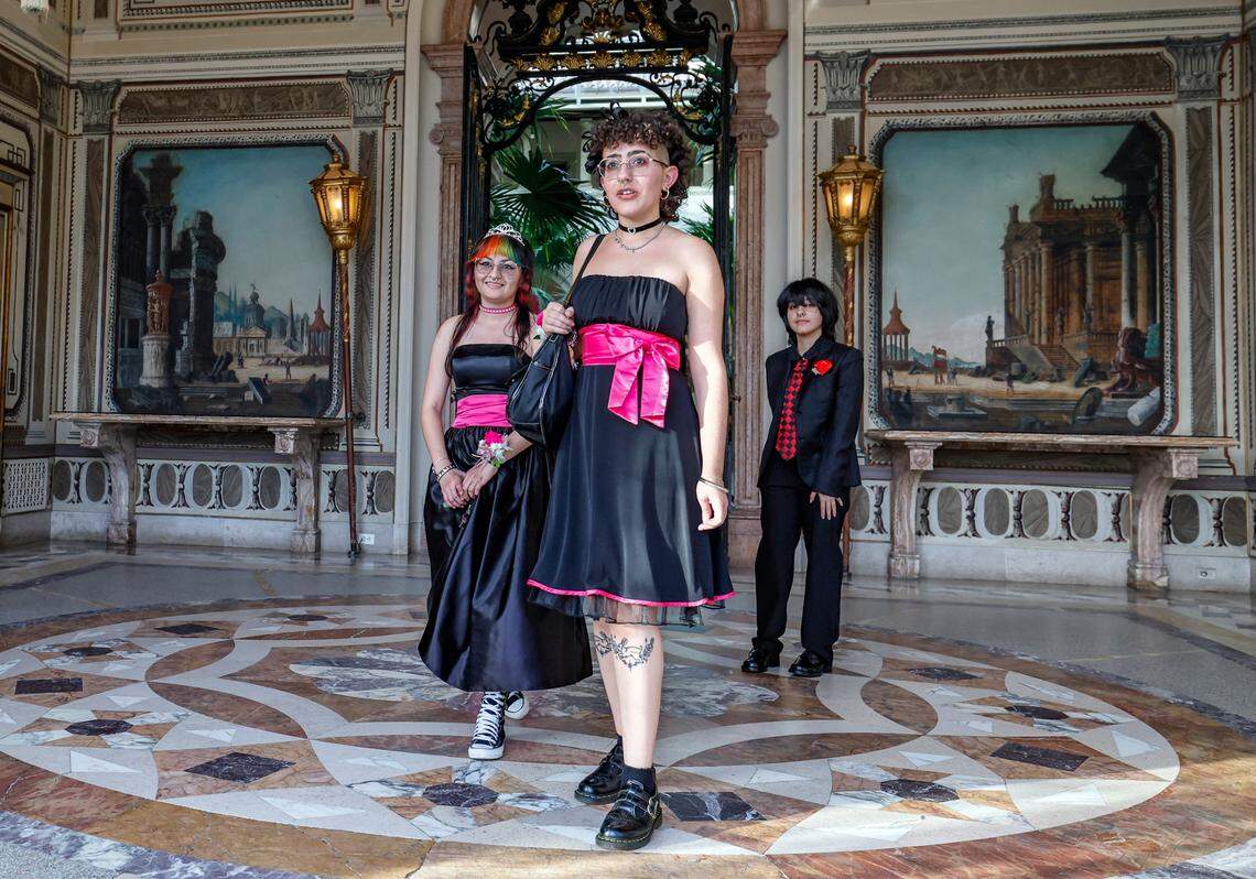 Sol Fernandez, 19, at center, arrives with Sophia Diaz, 20, at left, and Karsen Gonzalez, 18, at right, for Safe Schools South Florida’s prom for queer youth. The event provided students with the full prom experience in a welcoming and affirming space at the Vizcaya Museum and Gardens in Miami, Florida, on Saturday, May 31, 2025.