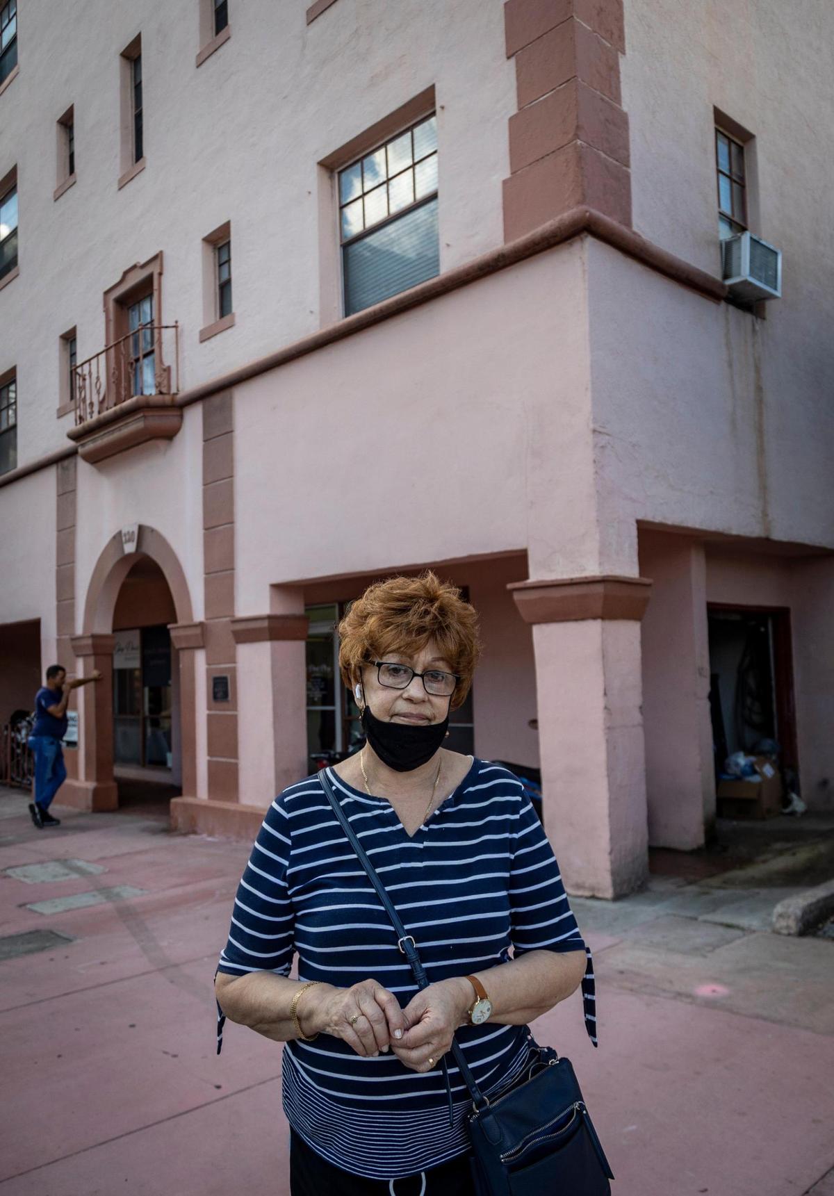 Clara Perdomo stands in front of Shep Davis Apartments on Sept. 13, 2022. Perdomo receives a Section 8 voucher but was recently told to leave. “It’s not fair,” she said.
