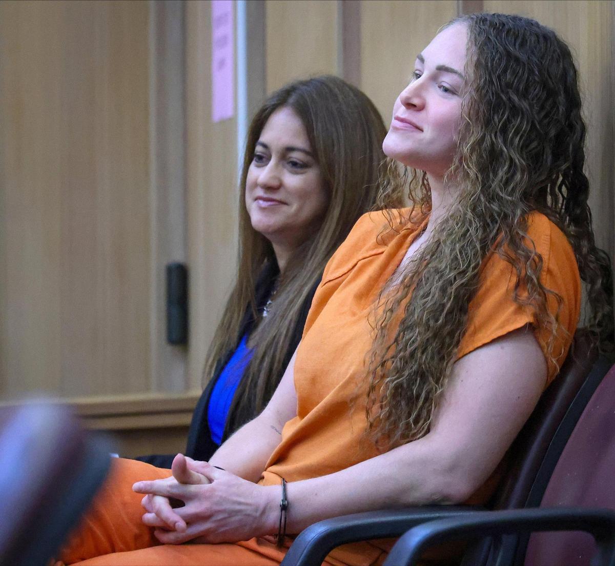 OnlyFans model and murder defendant, Courtney Clenney, right, appears in court as her defense lawyer argued that the Miami-Dade States Attorney’s Office should be disqualified following the exit of the lead prosecutor inside Courtroom 2-5 at the Richard E. Gerstein Justice Building on Thursday, May 22, 2025 in Miami, Florida.
