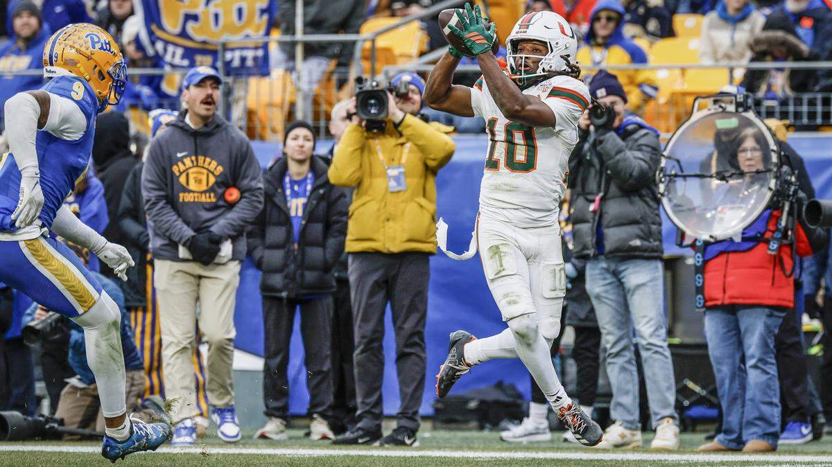 Miami Hurricanes wide receiver Malachi Toney (10) scores on a pass reception during the first half against the Pittsburgh Panthers during their NCAA football game at Acrisure Stadium in Pittsburgh, PA, on Saturday, November 29, 2025.