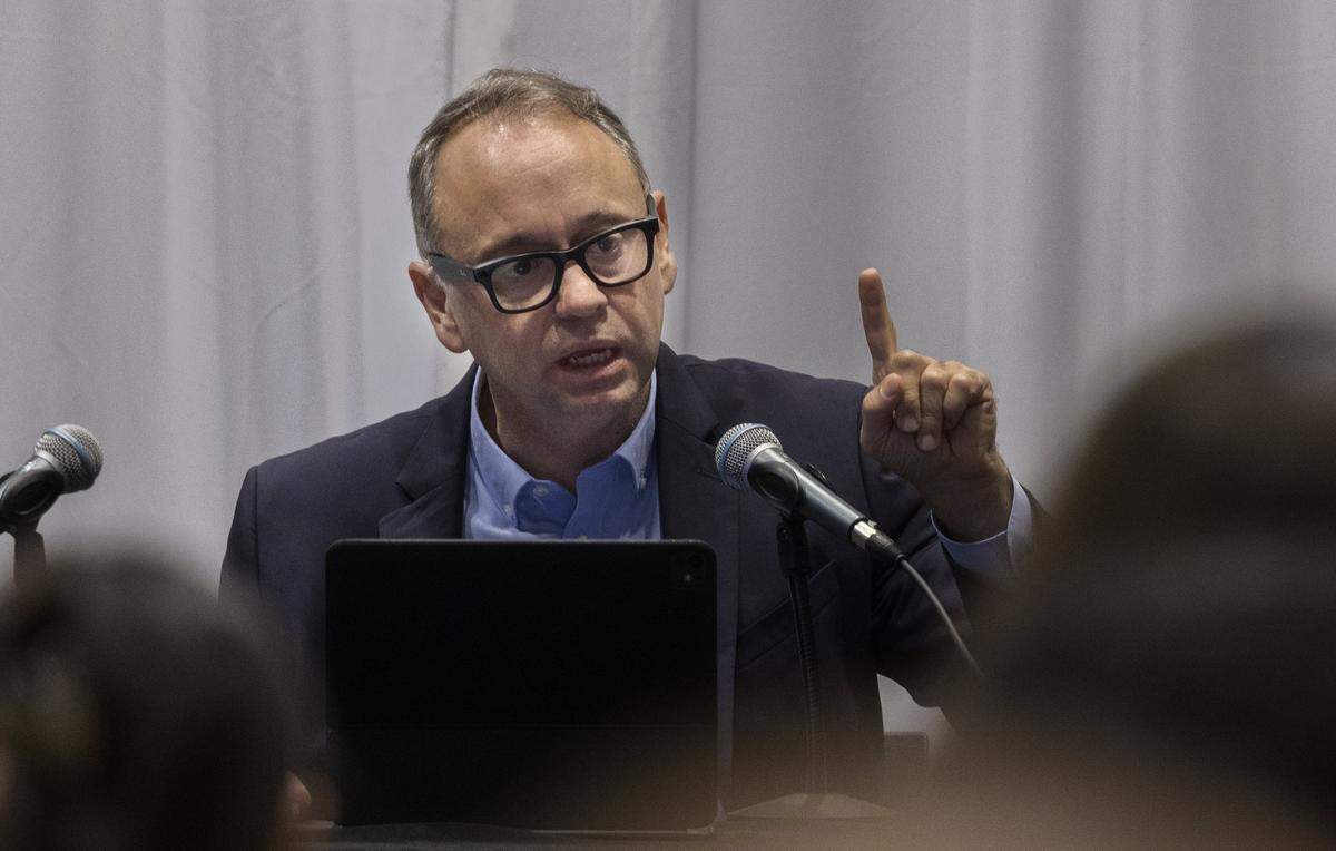Miami Dade College Board of Trustees member Marcell Felipe speaks during a special meeting held to discuss the potential real estate transactions including the authorization to convey a +/-2.63 acre surface parking lot at the Wolfson Campus for further conveyance for a Presidential Library for Donald J. Trump, celebrated at the MDC Hialeah Campus, on Wednesday, December 02 , 2025.