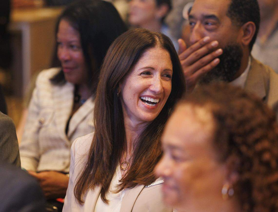 Hydi Webb, Port Director and CEO of PortMiami, center, is recognized during the ribbon cutting ceremony inside MSC cruise line's new office on Monday, Jan. 26, 2026, at Block 55 at Sawyer's Walk in downtown Miami, Fla.