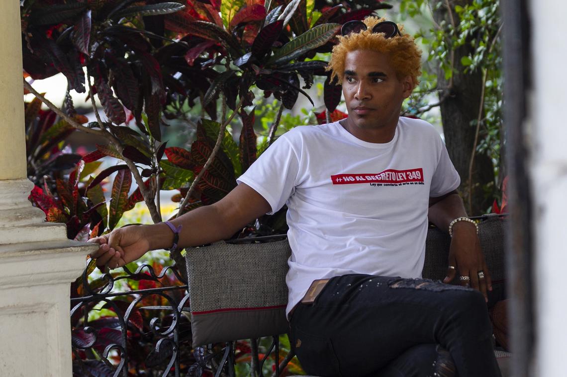 Cuban dissident artist Luis Manuel Otero Alcantara wears a T-shirt opposing Decree Law 349 on artistic expression. Otero has been arrested several times for protesting against the law.