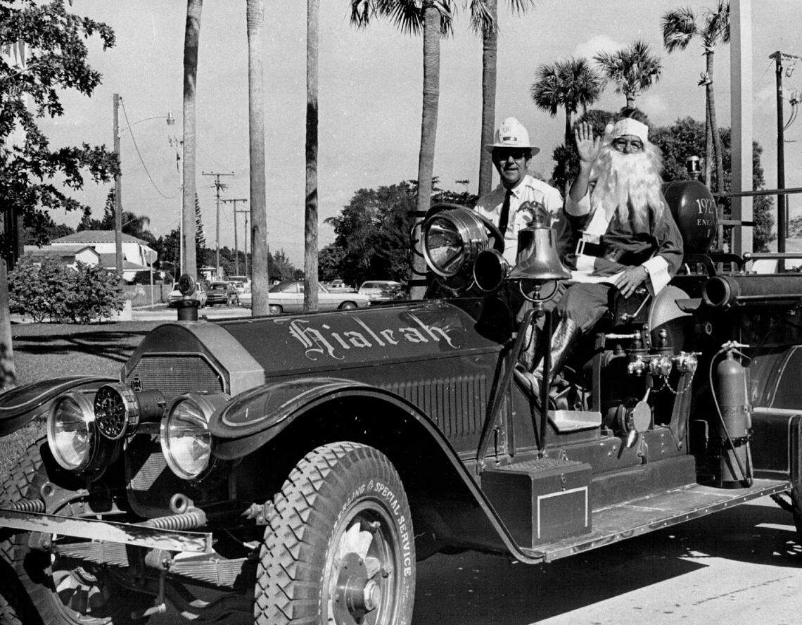 In 1976, Santa Claus visits kids at Hialeah Hospital in 1 1923 firetruck.