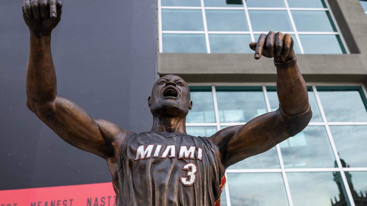 A newly unveiled statue of Miami Heat champion Dwyane Wade sits outside the Kaseya Center on Monday, October 28, 2024, in Miami, Fla.