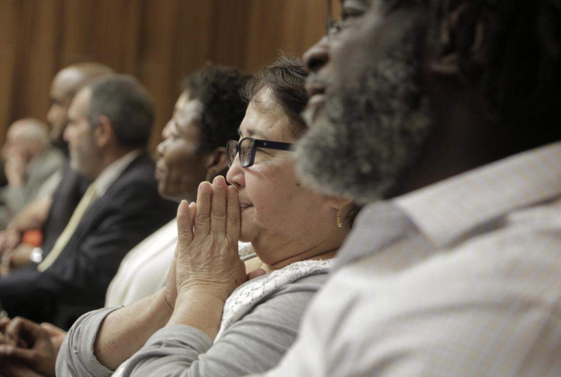 Gladys Soto, center, mother of Arnaldo Rios Soto, reacts during closing arguments in the Jonathon Aledda trial on March 14, 2019. Aledda, a North Miami police officer, shot her son’s caregiver, Charles Kinsey. To the right of the frame is Kinsey, who sat next to her during the closing arguments.