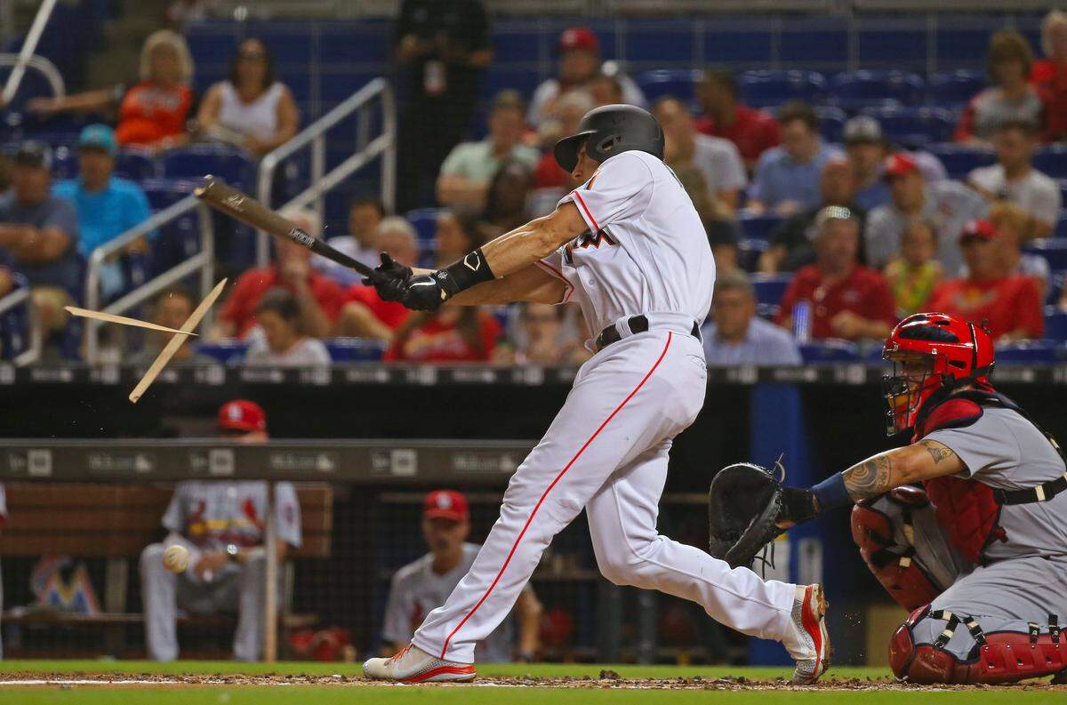 Miami Marlins catcher J.T. Realmuto broken bat foul during the third inning of a Major League Baseball game against the St. Louis Cardinals at Marlins Park on Wednesday, August 8, 2018.