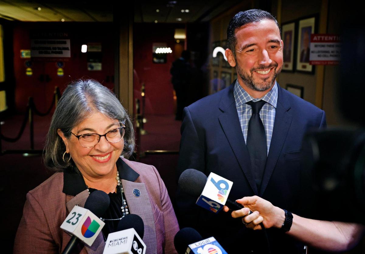 Miami-Dade Mayor Daniella Levine Cava and Xavier Gonzalez, Executive Vice President, Marketing Communications at Kaseya, speak to reporters after Miami-Dade commissioners approved the renaming of Miami-Dade Arena as the Kaseya Center after a Miami-based software firm at the Miami-Dade commission chambers in Miami on Tuesday, April 4, 2023.