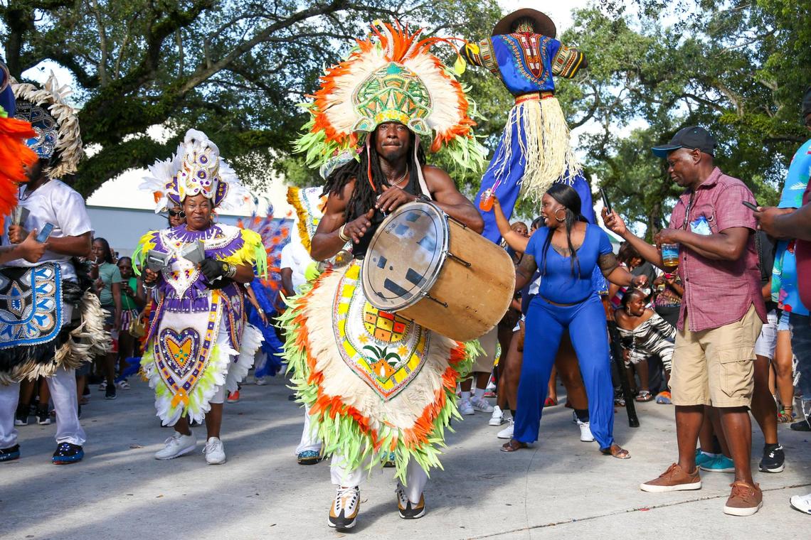 A member of the Junkanoo band plays the drum during a parade at the Coconut Grove Bahamian Goombay Festival at Elizabeth Virrick Park in Coconut Grove, Florida, on Sunday, June 12, 2022.