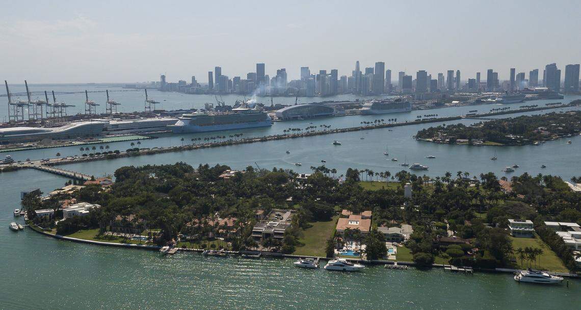 Aerial view shows cruise ships docked at PortMiami on Friday, April 12, 2024, in Miami.