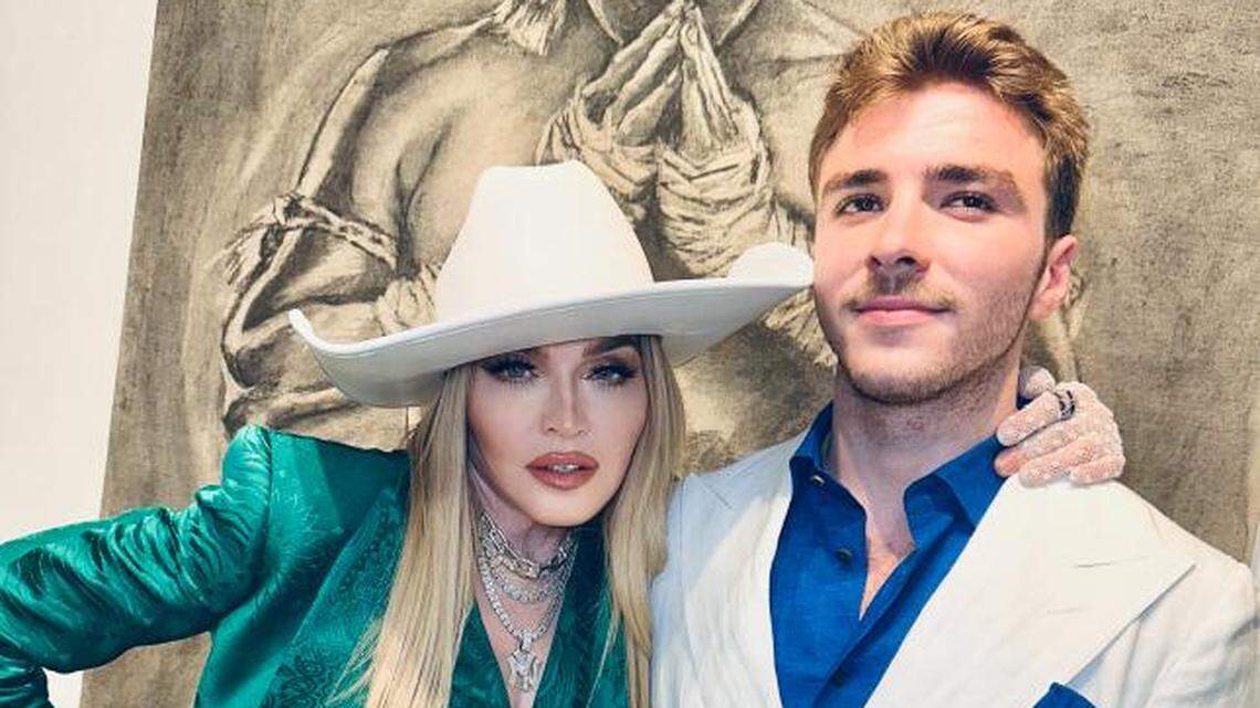 Pop icon Madonna and her son Rocco Ritchie at his United States solo exhibition debut in Miami’s Design District Wednesday night. Ritchie’s show, called “Pack a Punch,” is inspired by Muay Thai fighters.