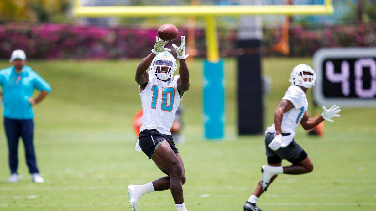 Miami Dolphins wide receiver Tyreek Hill catches a pass during the NFL football team’s organized team activities at Baptist Health Training Complex in Hard Rock Stadium on Tuesday, May 24, 2021 in Miami Gardens, Florida, in preparation for their 2022-23 NFL season.