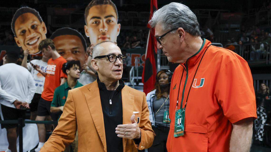 Joe Echevarria, President and CEO of the University of Miami and President of the University of Miami Health, speaks with athletic director Dan Radakovich during an NCAA basketball game between the Miami Hurricanes and Georgia Tech Yellow Jackets at the Watsco Center on the University of Miami Campus on Saturday, January 10, 2026 in Coral Gables, Florida.
