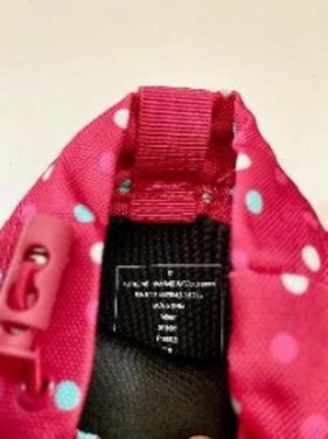 Where to find the item number on the recalled Cat & Jack boots