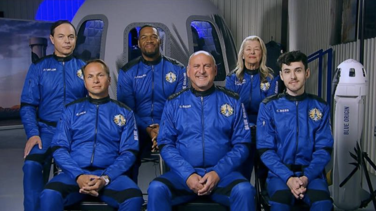 Lane Bess, center, and son Cameron, right, are blasting off aboard Jeff Bezos’ Blue Origin rocket.