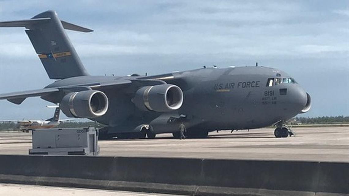 An Air Force C-17 Globemaster cargo airplane on the tarmac at Homestead Air Reserve Base in 2019. The base has a long runway that can be used for large freight operations.