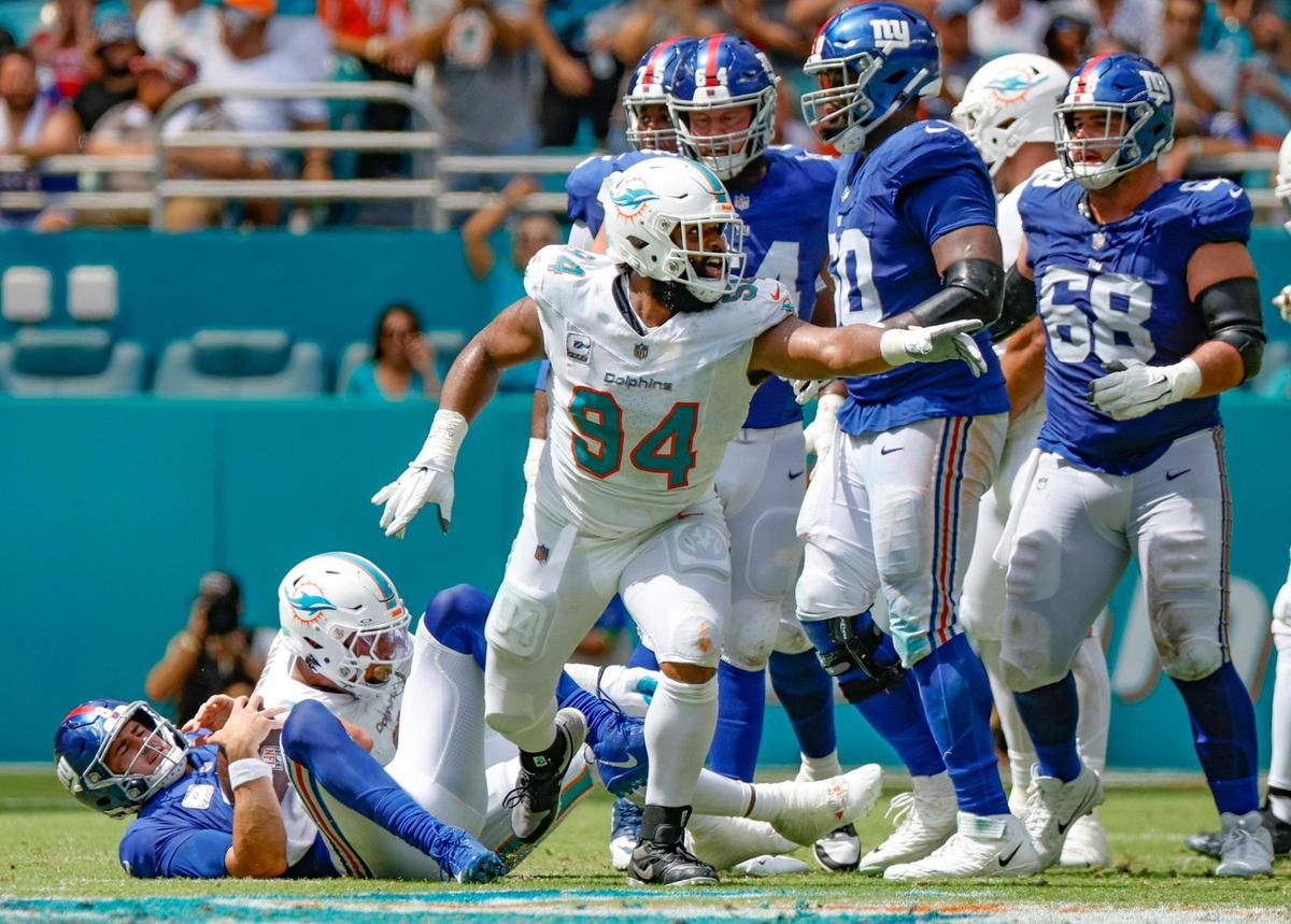 Miami Dolphins defensive tackle Christian Wilkins (94) reacts after sacking New York Giants quarterback Daniel Jones (8) in the first half at Hard Rock Stadium in Miami Gardens on Sunday.