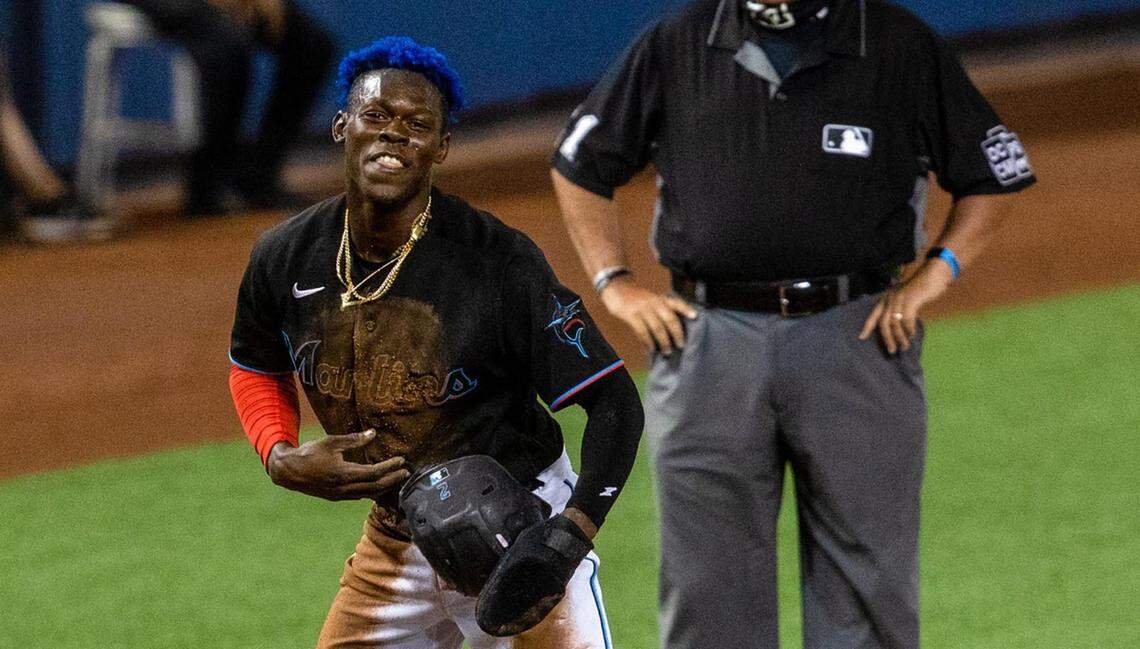 Miami Marlins Jazz Chisholm Jr.&nbsp;(2) reacts after stealing third base during the fourth inning of an MLB game against the Tampa Bay Rays at loanDepot park in the Little Havana neighborhood of Miami, Florida, on Saturday, April 3, 2021. 