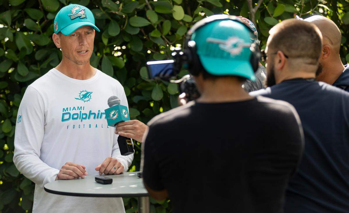 Miami Dolphins Outside Linebackers Coach Ryan Slowik speaks with reporters before the start of team practice at the Baptist Health Training Complex on Friday, Aug. 4, 2023 in Miami Gardens, Fla.