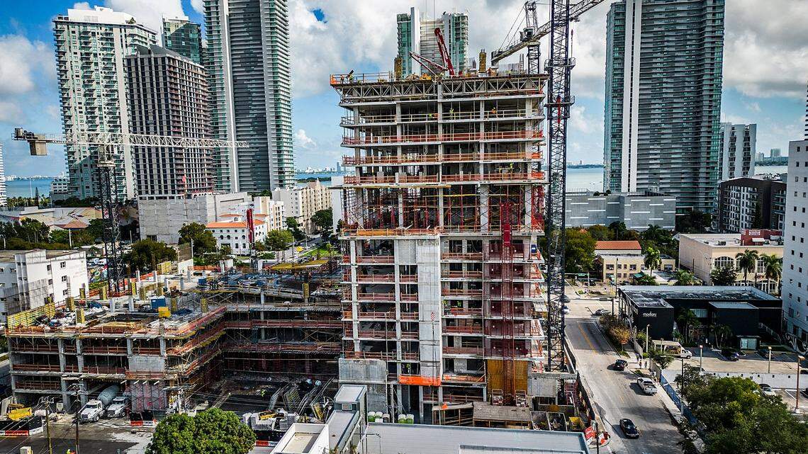 New home construction in Miami has focused on the pricey end, resulting in low supply for middle- and low-income residents. Last year, housing expenses were the main driver of soaring inflation in the metropolitan area. Here’s an aerial view looking east of a new building under construction at Northeast 29th Avenue in Miami’s Edgewater neighborhood on Dec. 30, 2022.