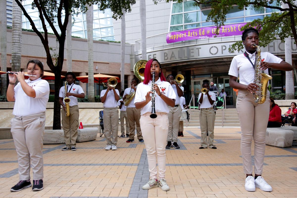High school students from the Booker T. Washington marching band perform during a Give Miami Day event at the Thomson Plaza for the Arts at the Arsht Center for the Performing Arts, in Miami, Florida, on Thursday, November 21, 2019.