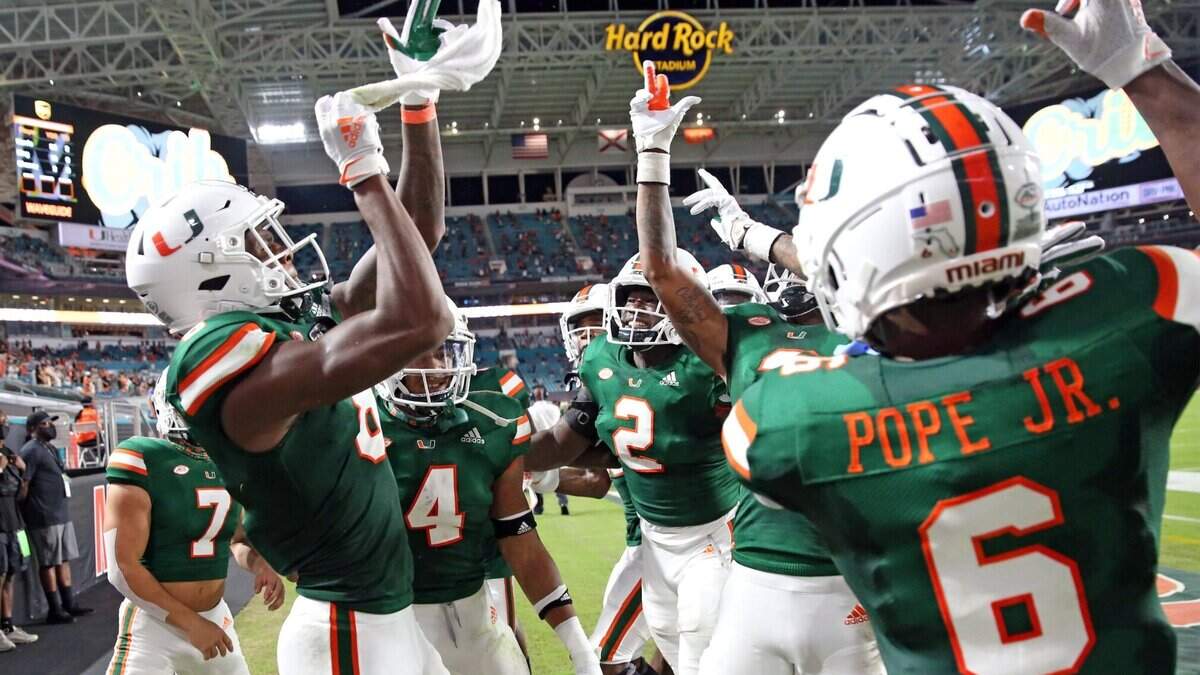 The Miami Hurricanes celebrate after scoring in the second quarter as the University of Miami was on its way to a 52-10 victory against Florida State at Hard Rock Stadium in Miami Gardens on Saturday, September 26, 2020.