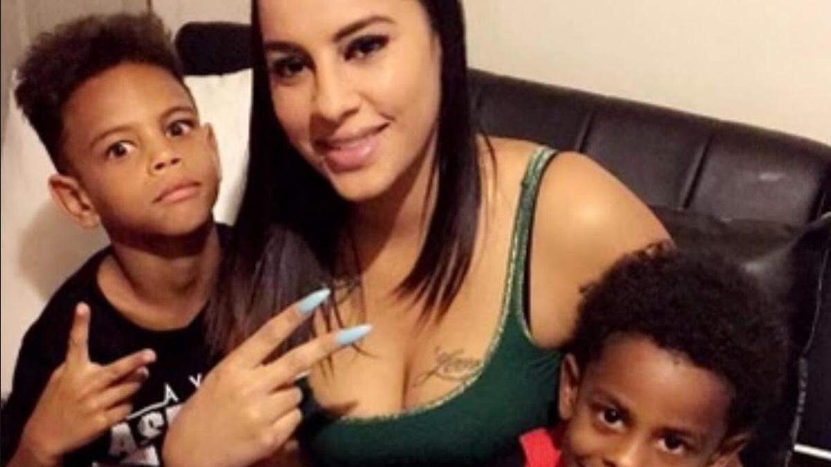 Jane Downs Humphreys is pictured with her sons, Leon Smith, 11, left and Jayden Smith, 10.