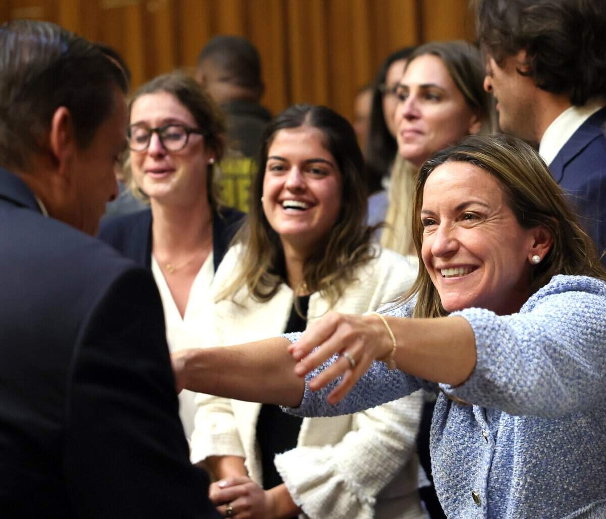 George Pino's wife Cecilia Pino, right, stretches her arms out to hug Pino, left, after the jury's verdict is read in court on Monday, June 22, 2026. Pino was facing manslaughter and vessel homicide charges.