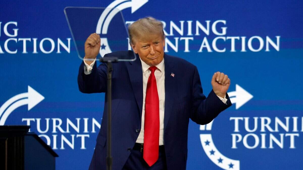 Donald Trump dances on stage during the Turning Point Action Conference at the Palm Beach County Convention Center in West Palm Beach, Florida, on Saturday, July 15, 2023.