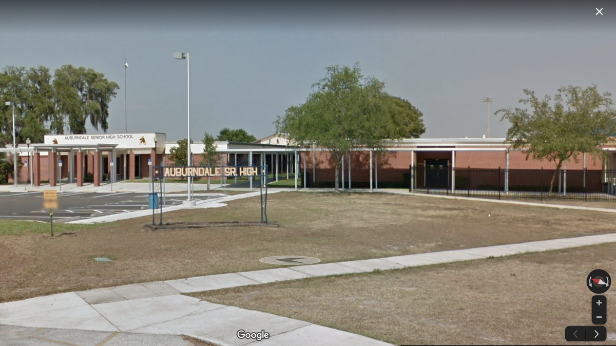 Police arrested and charged an Auburndale High School student with firearm possession Monday. Police say he had a loaded Glock .40-caliber handgun in his backpack.