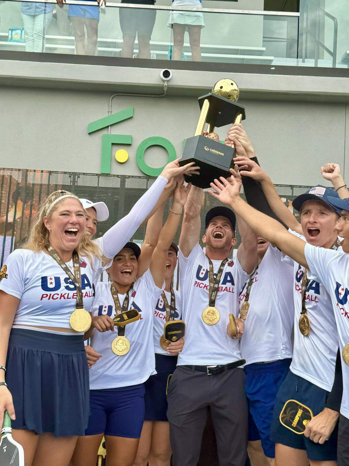 Team USA players celebrate after winning the 2025 Pickleball World Cup at The Fort in Fort Lauderdale, Fla.