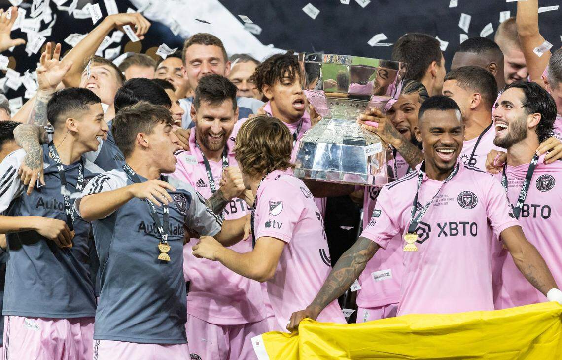Inter Miami players celebrate with the Leagues Cup trophy after they defeated Nashville SC in the final.
