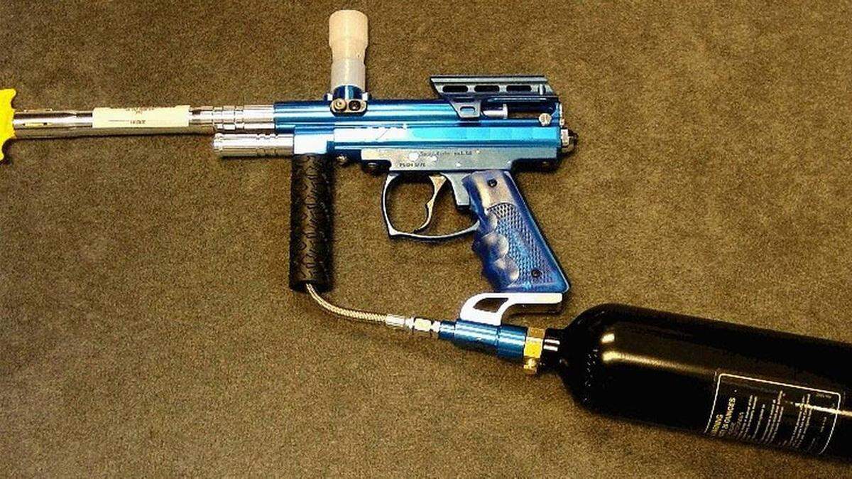 A standard paintball gun.
