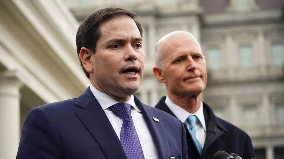 Florida U.S. Sens. Marco Rubio, left, and Rick Scott have supported the president.