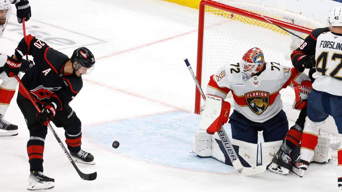 Carolina’s Sebastian Aho (20) can’t get to the puck during the second period of the Carolina Hurricanes’ game against the Florida Panthers in Game 2 of the Eastern Conference Final at the Lenovo Center in Raleigh, N.C., Thursday, May 22, 2025.