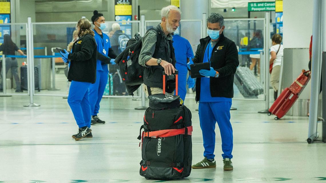 What are the new passenger health screenings like at Miami’s airport? See how they work