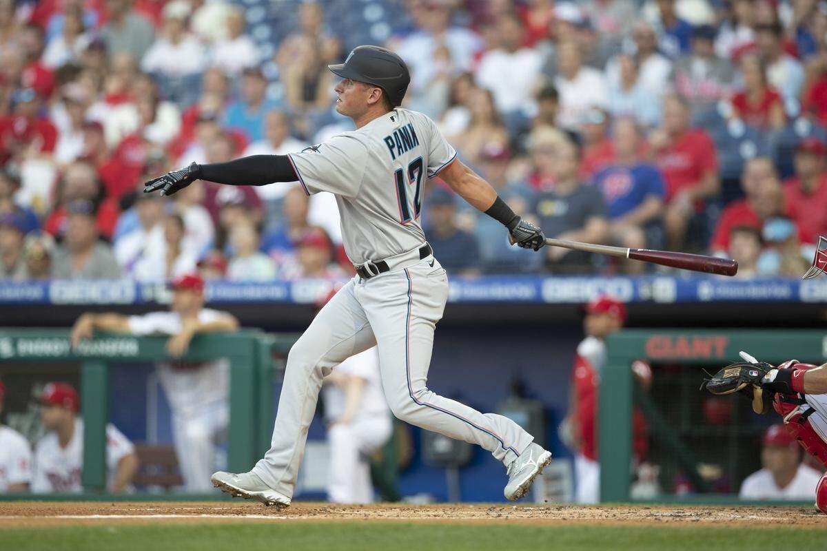 PHILADELPHIA, PA - JUNE 30: Joe Panik #12 of the Miami Marlins hits a solo home run in the top of the second inning against the Philadelphia Phillies at Citizens Bank Park on June 30, 2021 in Philadelphia, Pennsylvania. (Photo by Mitchell Leff/Getty Images)