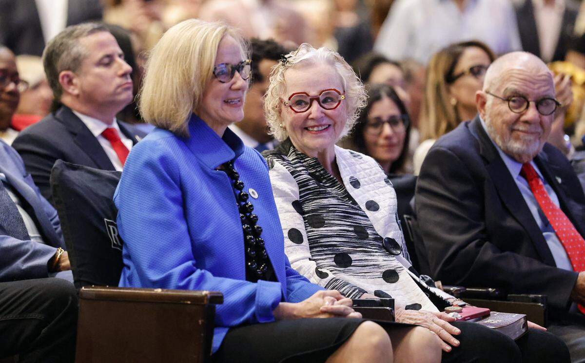 The parents of Eileen Higgins, Patricia and Cornelius watch their daughter  during the installation ceremony as the Mayor of the City of Miami at the Miami-Dade College Wolfson Campus Auditorium in Miami, Florida, on Thursday, December 18, 2025. 