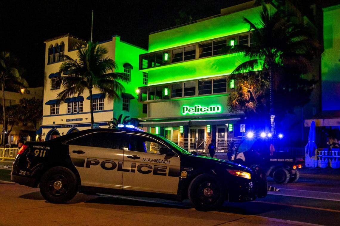 Miami Beach Police ride their all-terrain vehicles in the street as they clear Ocean Drive because the City of Miami Beach imposed a curfew at midnight to curb violence during Spring Break in Miami Beach, Florida, on Thursday, March 24, 2022. On Friday, a Miami-Dade judge upheld the city’s curfew.